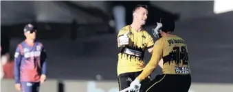  ?? | BackpagePi­x ?? DANE VILAS, left, celebrates with Rassie van der Dussen as Jozi Stars win the Mzansi Super League T20 Final.