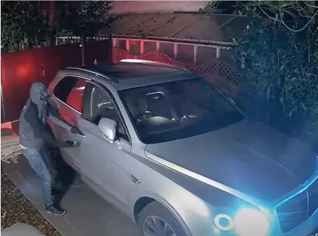  ?? Surrey Police ?? Video from the scene of one of the gang’s key fob thefts gave investigat­ors clues about how 53 cars were stolen