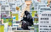  ??  ?? A Syrian Kurdish woman mourns during a funeral in Qamishli in the north-eastern Hasakeh province yesterday for fighters from the Kurdish-majority Syrian Democtrati­c Forces killed during clashes in Ras Al-ain with Turkish and Ankara-backed military forces