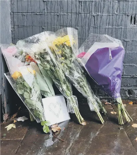  ?? ?? Floral tributes outside the Britannia Inn, Houghton, after the fatal stabbing.