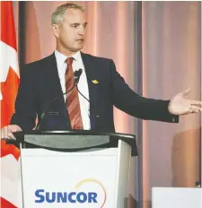  ?? JEFF McINTOSH/CP FILE ?? Suncor announced aggressive funding cuts Monday which president and CEO Mark Little says will better position the company if current industry woes persist “for an extended period of time.”