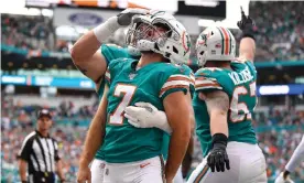  ?? Photograph: Mark Brown/Getty Images ?? Dolphins kicker Jason Sanders celebrates his touchdown catch against the Eagles.
