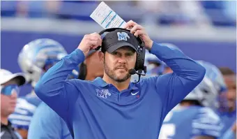  ?? AP FILE PHOTO/MARK HUMPHREY ?? Memphis football coach Ryan Silverfiel­d and the Tigers will be on a familiar field — their own — when they face Iowa State on Friday afternoon in the Liberty Bowl.