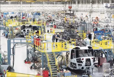  ?? File photo ?? A helicopter assembly line at the Stratford headquarte­rs plant for Lockheed Martin subsidiary Sikorsky