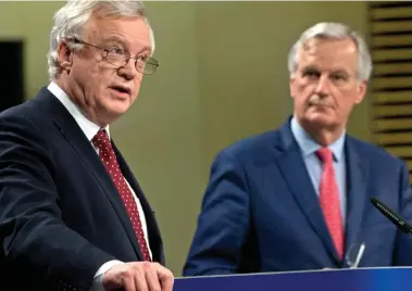  ??  ?? Talks: Brexit Secretary David Davis and chief negotiator Michel Barnier yesterday