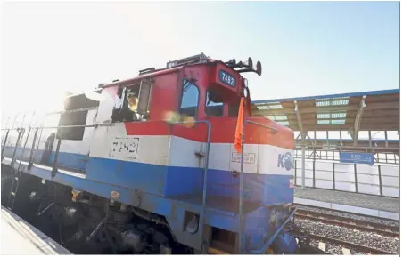  ?? — AP ?? Wheels set in motion: The South Korean train preparing to travel across the border into North Korea on Dorasan station in Paju, South Korea.