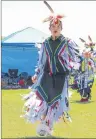  ?? ERIN POTTIE/CAPE BRETON POST ?? Aiden Gloade of Millbrook First Nation was among a group of grass dancers who performed a blessing on the Eskasoni powwow field.