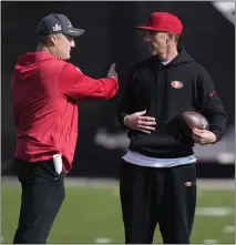  ?? JOHN LOCHER — THE ASSOCIATED PRESS ?? San Francisco 49ers coach Kyle Shanahan, right, has been involved with two Super Bowl defeats: “Both of them are heartbreak­ing.”