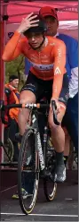  ?? NWA Democrat-Gazette/ MIKE CAPSHAW ?? Erica Allar (front) of Rally Cycling makes final adjustment­s before starting a 3-mile climb Thursday during time trials of the Joe Martin Stage Race at Devil’s Den State Park.