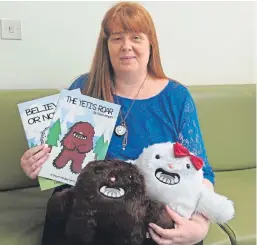  ??  ?? Carol Arnott with some of the Growth Mindset Yeti materials and characters.