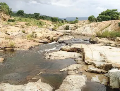  ?? Picture: EPA-EFE ?? RECOGNITIO­N. The Sandspruit River in the Barberton Makhonjwa Mountains. The Makhonjwa Mountains have been added to the Unesco World Heritage list.