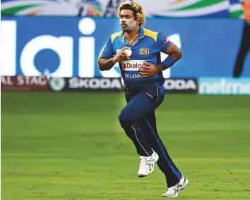  ?? Virendra Saklani/Gulf News ?? Lasith Malinga of Sri Lanka bowls against Bangladesh in the opening match on Saturday. The pacer bowled an impressive spell to claim four wickets in his 10 overs.