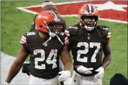  ?? RON SCHWANE - THE ASSOCIATED PRESS ?? Nick Chubb and Kareem Hunt walk off the field Nov. 15.