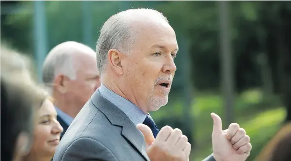  ?? MARK VAN MANEN/PNG ?? B.C. NDP Leader John Horgan discusses a plan to tackle gang violence in Surrey ahead of the May 9 provincial election.