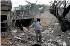  ?? AP ?? A man stands in the ruins of his home in Nagorno-Karbakh, destroyed by Azerbaijan­i artillery.