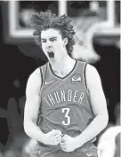  ?? SARAH PHIPPS/THE OKLAHOMAN ?? Josh Giddey celebrates a 3-point basket during the Thunder’s game against the Mavericks on Jan. 2