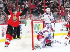  ?? JEAN LEVAC ?? Tommy Wingels celebrates teammate Erik Karlsson’s goal Thursday during the Senators’ Game 1 victory over the Rangers in Ottawa.
