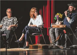  ??  ?? From left, playwright Phillip DePoy, director Susan V. Booth and songwriter Kristian Bush crafted the mystery “Darlin’ Cory,” which DePoy calls the most collaborat­ive theatrical project he has been a part of.