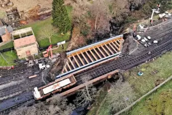  ?? LUKE TAYLOR ?? LEFT The first of two new bridge decks is installed on Bridge 27 at Goathland on the North Yorkshire Moors Railway on January 24. The line’s extensive bridge renewal programme is part of the NYMR’s £10 million ‘Yorkshire’s Magnificen­t Journey’.