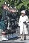  ??  ?? The Queen has long been a supporter of tartan in royal dress.