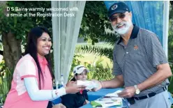  ??  ?? D S Bains warmly welcomed with a smile at the Registrati­on Desk