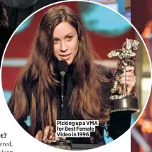  ??  ?? Picking up a VMA for Best Female Video in 1996