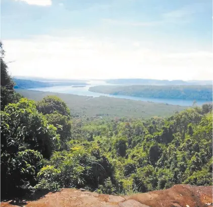  ??  ?? The view from the top of a waterfall in Koh Kong, Cambodia.