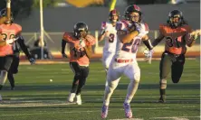  ?? Christy Murphy / MaxPreps ?? Clayton Valley-Concord’s Christian Seeley returns a punt for a touchdown in the Ugly Eagles’ Week 1 win at Pittsburg.