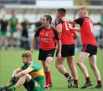  ?? Photos: Joe Byrne ?? Coolkenno’s Eamonn Rossiter, Pauric Murray and Eoghan Dolan celebrate after the final whistle of the IFC semi-final with Kilcoole in Aughrim.