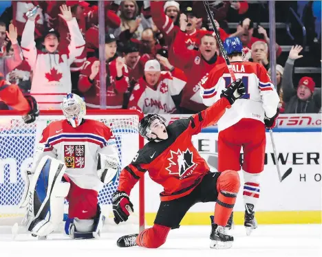  ?? NATHAN DENETTE/THE CANADIAN PRESS ?? Drake Batherson celebrates his second of three goals on Czech goalie Josef Korenar during Canada’s 7-2 world junior semifinal win at KeyBank Center on Thursday in Buffalo, N.Y. Canada will play Sweden for gold today.