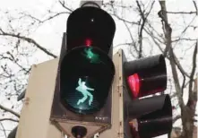  ?? — AFP ?? A pedestrian traffic light customized with a dancing Elvis Presley is pictured in Friedberg, western Germany.