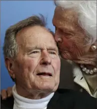  ?? Charles Krupa/Associated Press ?? Former President George H.W. Bush and first lady Barbara Bush are seen in 2012 near the family compound in Kennebunkp­ort, Maine. Mrs. Bush died April 17.