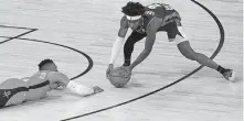  ?? J. TERRILL] ?? Houston's Russell Westbrook (0) looks on as Oklahoma City's Shai Gilgeous-Alexander (2) wins control of a loose ball during the second half of the Thunder's 104-100 win Monday in Game 6. [AP PHOTO/MARK