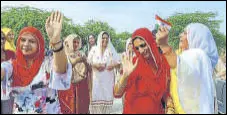  ?? MANOJ DHAKA/HT PHOTO ?? Relatives of Ravi Dahiya celebrate the silver.