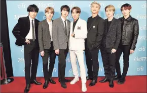  ?? Richard Shotwell / AP ?? Time magazine named BTS, the South Korean group, its 2020 Entertaine­r of the Year.