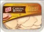  ??  ?? In Kraft Foods Inc. photo, a package of Oscar Mayer Carving Board Turkey Breast is shown. More companies are now trying to make processed foods appear more homespun.