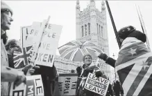  ?? TOLGA AKMEN/AGENCE FRANCE-PRESSE TOLGA AKMEN/AGENCE FRANCE-PRESSE ?? The U.K. Parliament will be on recess from Dec. 20 to Jan. 7, during which time May hopes voters will push lawmakers toward a Brexit deal.