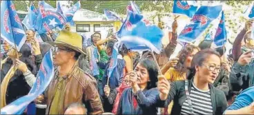  ?? PTI ?? ▪ Mizo National Front (MNF) workers celebrate their party's poll victory in Aizawl on Tuesday.