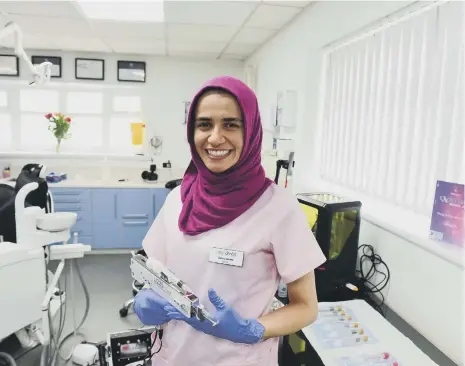  ??  ?? Award-winning dentist Salma Ainine.