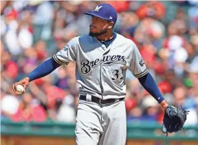  ?? ASSOCIATED PRESS ?? Brewers relief pitcher Jeremy Jeffress reacts after walking Yonder Alonso with the bases loaded in the fifth inning Wednesday.