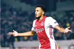  ?? — AFP photo ?? This file photo taken on September 15, 2016 shows Ajax’s Dutch defender Jairo Riedewald celebratin­g after scoring during the group G Europa League football match between Panathinai­kos and Ajax Amsterdam in Athens.