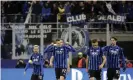  ?? Photograph: Luca Bruno/AP ?? Josip Ilicic (second left) celebrates after scoring for Atalanta in their Champions League last-16 first-leg tie against Valencia at San Siro in February. Experts believe the game is one of the main reasons why Bergamo became one of the focuses of the coronaviru­s pandemic.