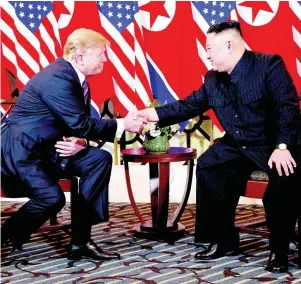  ?? AP ?? President Donald Trump meets North Korean leader Kim Jong Un yesterday in Hanoi.