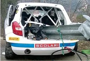  ?? AP/PA ?? Horrendous: a barrier cut through the middle of Kubica’s car — and the Polish driver’s right arm is still damaged (below)