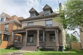  ??  ?? The 98-year-old house has front and back porches and lots of original trim.