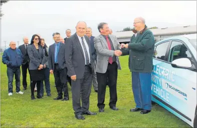  ?? PHOTO/ CHRISTINE MCKAY ?? DANNEVIRKE company Scanpower has donated a Hyundai IONIQ electric car to the community vehicle trust. Handing over the keys, Allan Benbow, chairman of the Scanpower board, front left, Keith Cammock, chairman of the Scanpower Customer Trust and Bob...