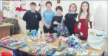  ?? ?? Many thanks to 4th Class in Kildorrery National School for their Ukrainian aid collection. Some pupils are pictured proudly displaying items collected.