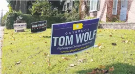  ?? JANE THERESE/SPECIAL TO THE MORNING CALL ?? Campaign signs in Bethlehem show the fervor of local voters in the midterm election, which one political scientist said is in part due to President Donald Trump: Opponents of his agenda want to check his authority while supporters hope to keep Congress in Republican control.