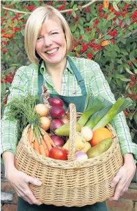  ??  ?? ●● April Green with some of the ingredient­s for her Student Grub boxes.