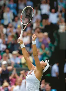  ?? ALASTAIR GRANT/AP ?? Britain’s Heather Watson celebrates defeating Slovenia’s Kaja Juvan in the third round of Wimbledon on Friday in London.